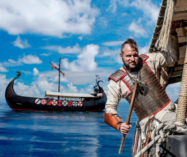 Guerreros vikingos en barco
